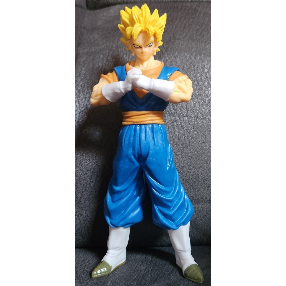 The figure is a Banpresto Dragon Ball Super Clearise Super Saiyan Vegito...